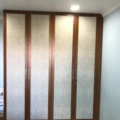 Cane Finish Hinged Wardrobe by KK modular Kitchen and Interiors in Mumbai