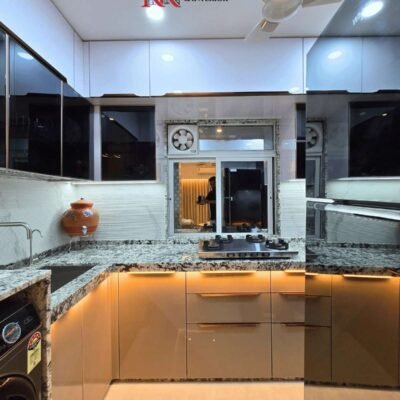 elegant modular kitchen interiors with warm ambient lighting by kk modular kitchen