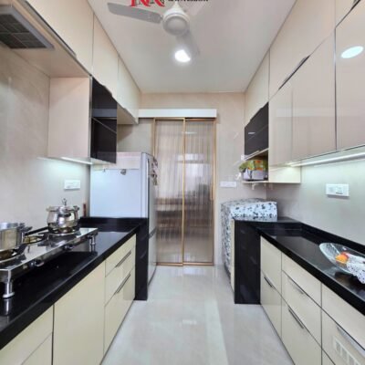 modern kitchen with lift up cabinets and smart storage by kk modular kitchen