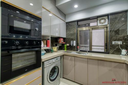 Inbuilt - Micro And Oven Also Washing Machine Provision In Kitchen