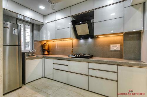 White Kitchen With Gray Dotted Quartz
